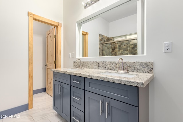 bathroom featuring vanity and walk in shower