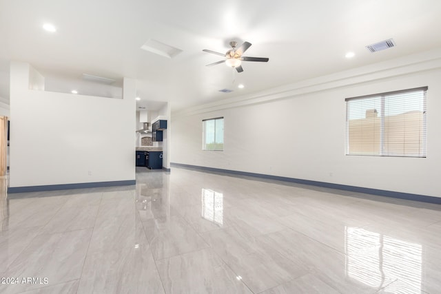 unfurnished room with ceiling fan