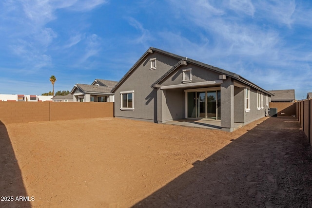 back of property featuring a patio area