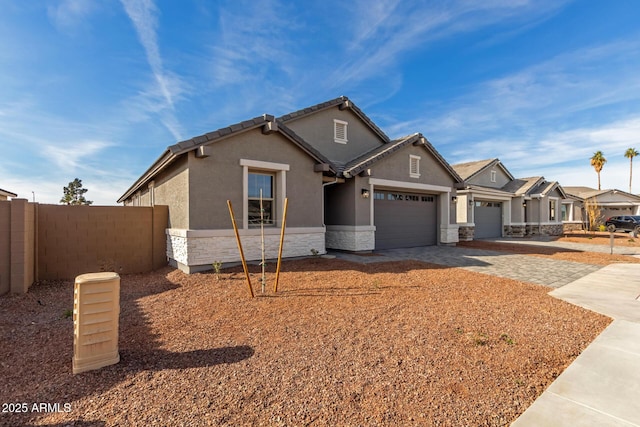 view of front of property with a garage