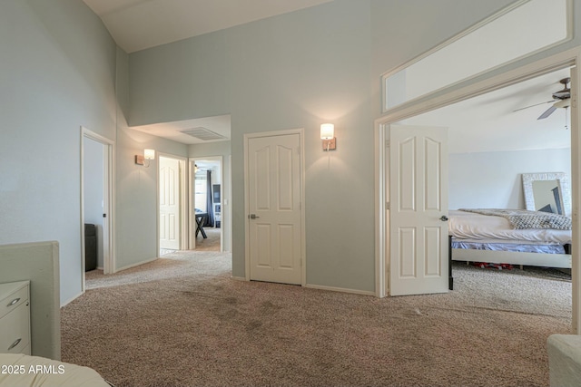 2218 E Anchor Dr, Gilbert, AZ 85234 - bedroom with visible vents, carpet flooring, baseboards, and a towering ceiling
