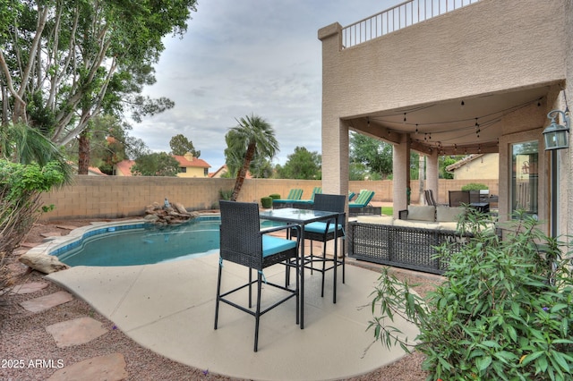 2218 E Anchor Dr, Gilbert, AZ 85234 - view of swimming pool featuring a fenced in pool, a fenced backyard, an outdoor hangout area, a patio area, and outdoor dining area