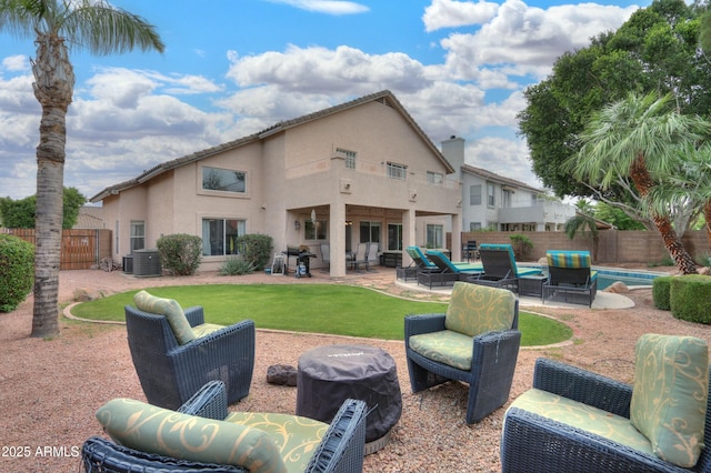 2218 E Anchor Dr, Gilbert, AZ 85234 - rear view of property featuring a fenced backyard, a yard, a patio, and stucco siding
