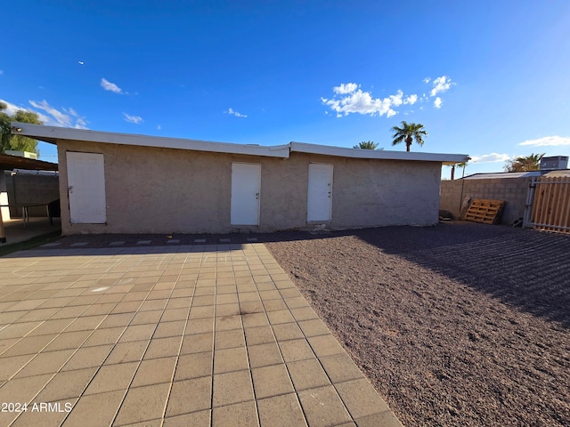 rear view of property with a patio