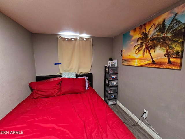 bedroom featuring hardwood / wood-style flooring