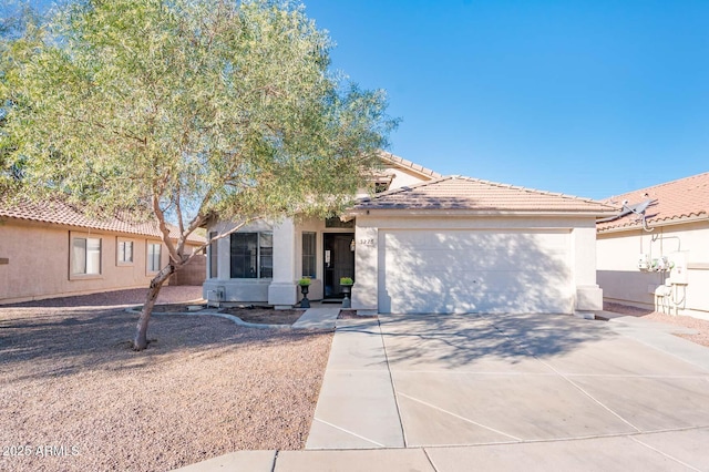 view of front of home with a garage