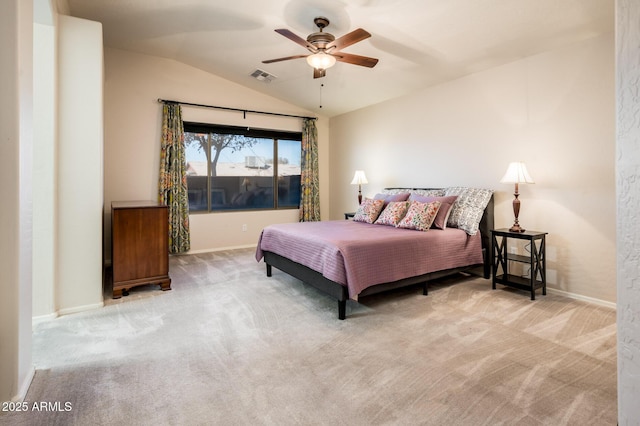 bedroom with lofted ceiling, light carpet, and ceiling fan