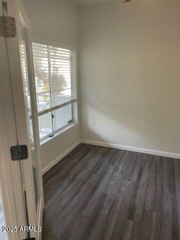 empty room featuring dark hardwood / wood-style floors