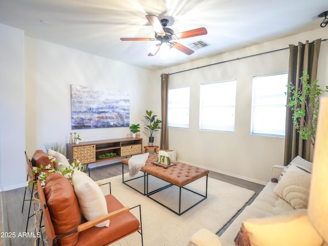 35721 N Zachary Rd, Queen Creek, AZ 85144 - living area featuring baseboards, ceiling fan, visible vents, and wood finished floors