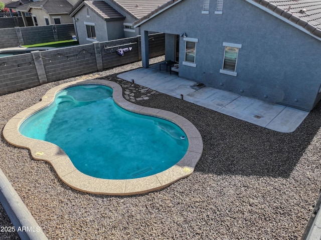35721 N Zachary Rd, Queen Creek, AZ 85144 - view of swimming pool featuring a fenced backyard and a patio area