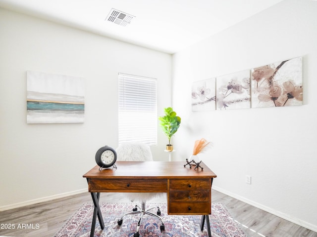 35721 N Zachary Rd, Queen Creek, AZ 85144 - office space with baseboards, light wood-type flooring, and visible vents