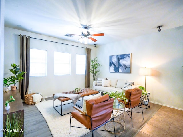 35721 N Zachary Rd, Queen Creek, AZ 85144 - living area featuring baseboards, a ceiling fan, and visible vents