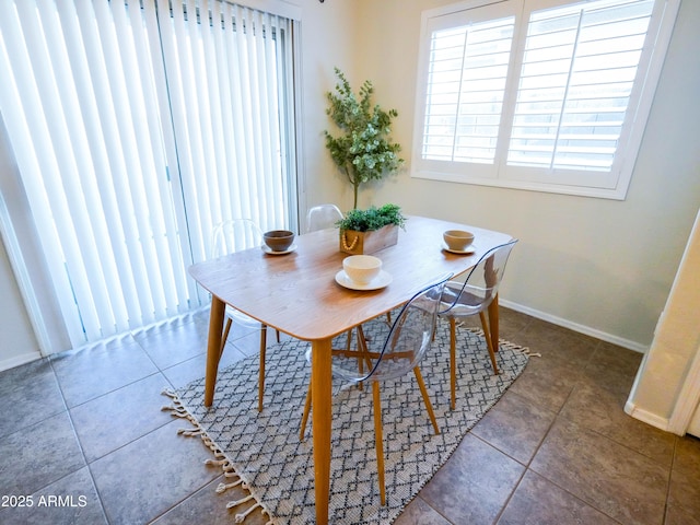 35721 N Zachary Rd, Queen Creek, AZ 85144 - tiled dining area with a healthy amount of sunlight and baseboards