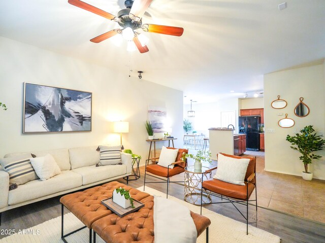35721 N Zachary Rd, Queen Creek, AZ 85144 - living room with ceiling fan and light wood-style flooring