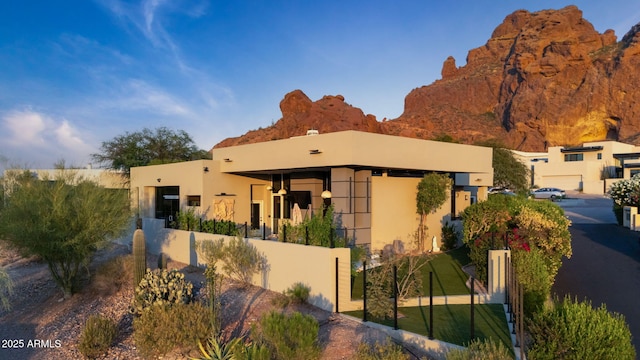 5905 N Echo Canyon Ln, Phoenix, AZ 85018 - southwest-style home featuring stucco siding and a mountain view