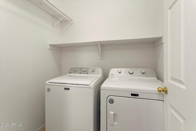 clothes washing area with laundry area and separate washer and dryer