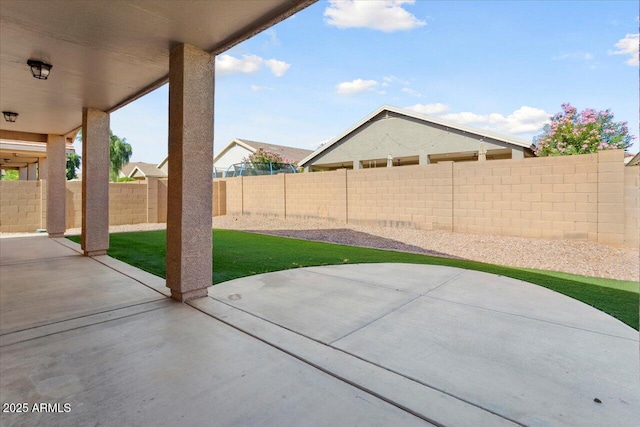 view of patio with a fenced backyard