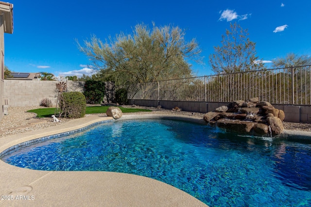 view of swimming pool featuring pool water feature