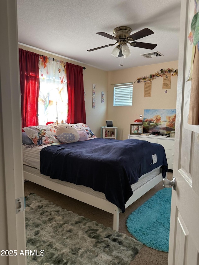 1448 E Mobile Ln, Phoenix, AZ 85040 - carpeted bedroom with ceiling fan