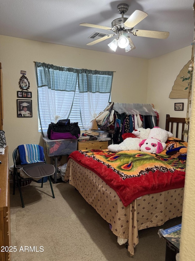 1448 E Mobile Ln, Phoenix, AZ 85040 - carpeted bedroom with ceiling fan