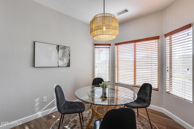 dining room featuring hardwood / wood-style flooring