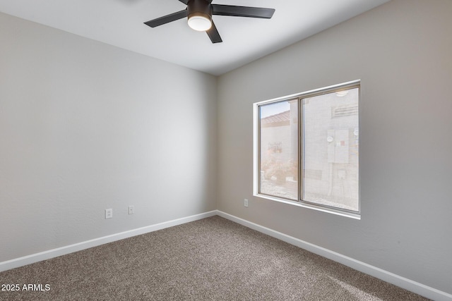 unfurnished room featuring carpet and ceiling fan