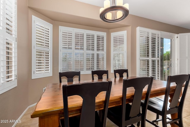1268 N Pine St, Gilbert, AZ 85233 - dining area featuring a chandelier and light tile patterned floors