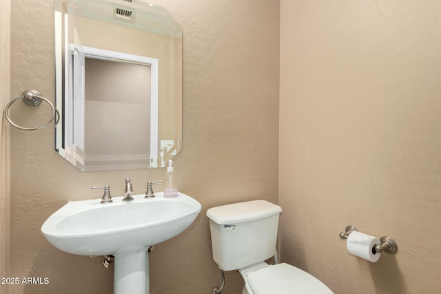 1268 N Pine St, Gilbert, AZ 85233 - half bath with toilet and a textured wall