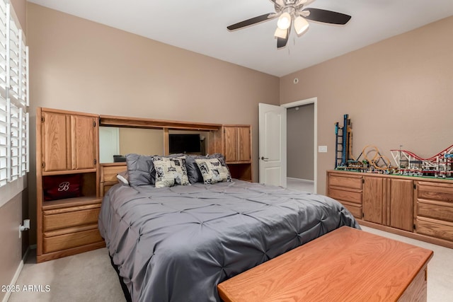 1268 N Pine St, Gilbert, AZ 85233 - bedroom with light colored carpet and a ceiling fan