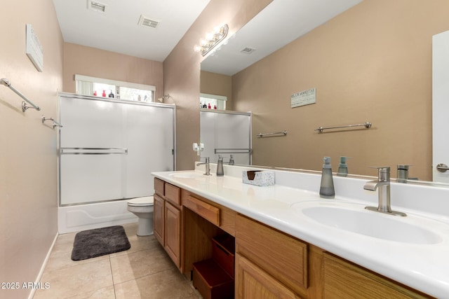 1268 N Pine St, Gilbert, AZ 85233 - bathroom with double vanity, tile patterned floors, and combined bath / shower with glass door
