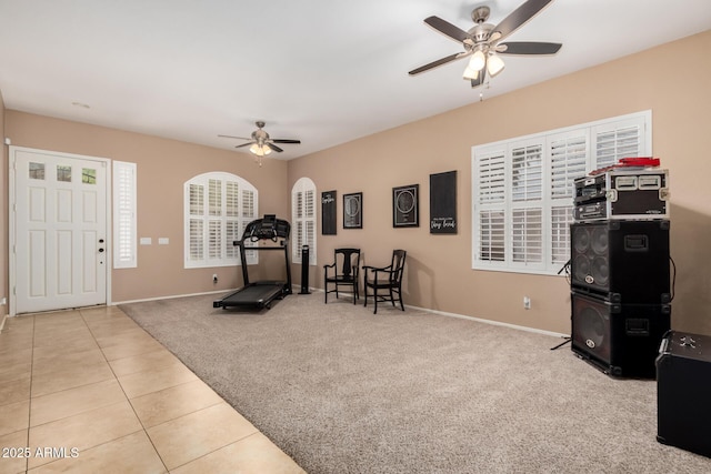 1268 N Pine St, Gilbert, AZ 85233 - workout room featuring a ceiling fan, carpet flooring, and tile patterned flooring