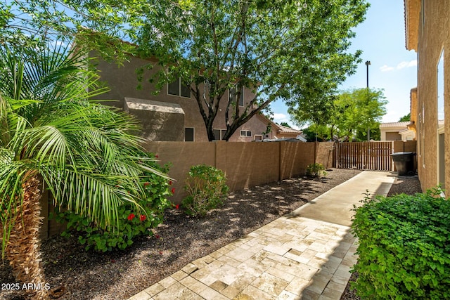 1268 N Pine St, Gilbert, AZ 85233 - fenced backyard featuring a patio area