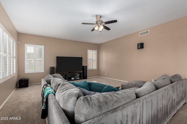1268 N Pine St, Gilbert, AZ 85233 - living area featuring carpet, ceiling fan, and healthy amount of natural light
