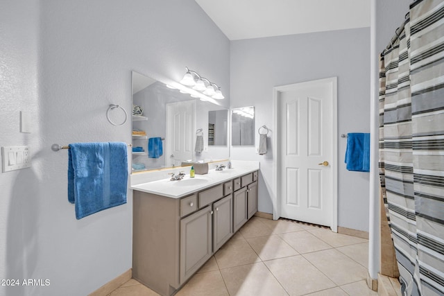 bathroom featuring vanity, tile patterned floors, and a shower with curtain