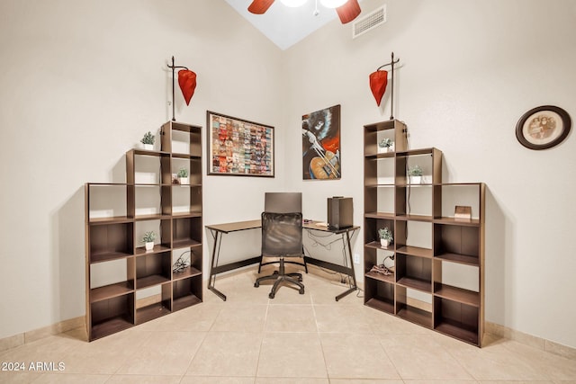 tiled office space featuring high vaulted ceiling and ceiling fan