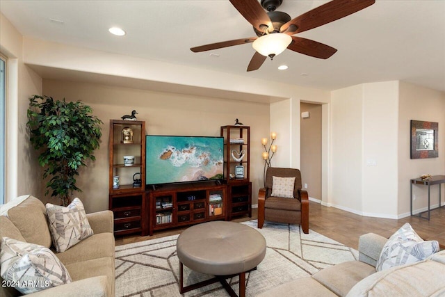 living room featuring ceiling fan