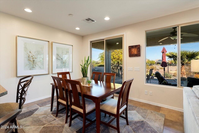 dining space with ceiling fan