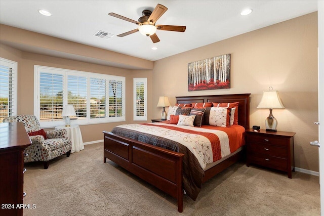 carpeted bedroom with ceiling fan