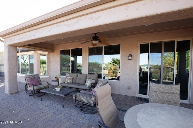 view of patio / terrace featuring an outdoor living space and ceiling fan