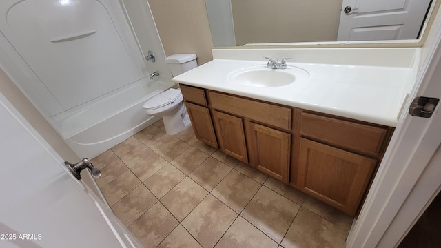 full bathroom with washtub / shower combination, tile patterned floors, toilet, and vanity