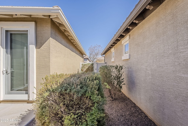 1170 S Agnes Ln, Gilbert, AZ 85296 - view of side of home with stucco siding