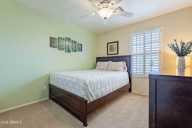 bedroom featuring ceiling fan and light colored carpet