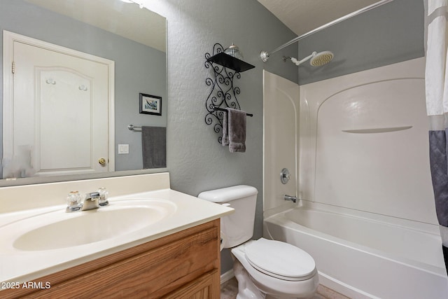 full bathroom with toilet, vanity, and bathing tub / shower combination