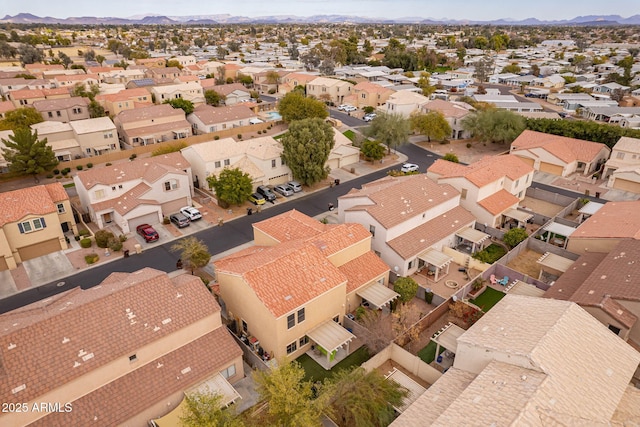 drone / aerial view featuring a mountain view