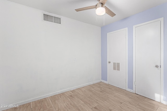 empty room with ceiling fan