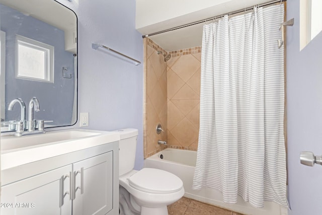 full bathroom with tile patterned flooring, vanity, toilet, and shower / bath combo with shower curtain