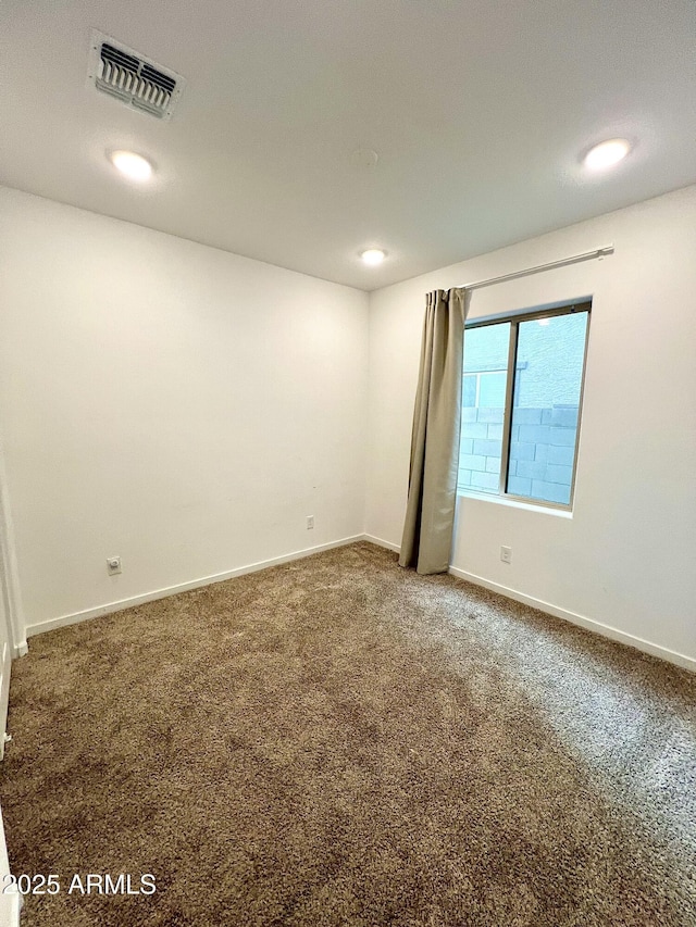 spare room with carpet flooring