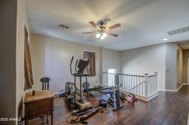 6811 W Darrel Rd, Laveen, AZ 85339 - workout room with baseboards, ceiling fan, visible vents, and wood finished floors