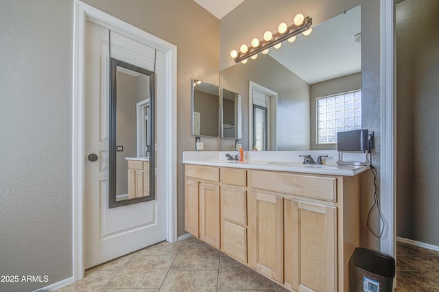 6811 W Darrel Rd, Laveen, AZ 85339 - full bathroom with tile patterned flooring, double vanity, and a sink