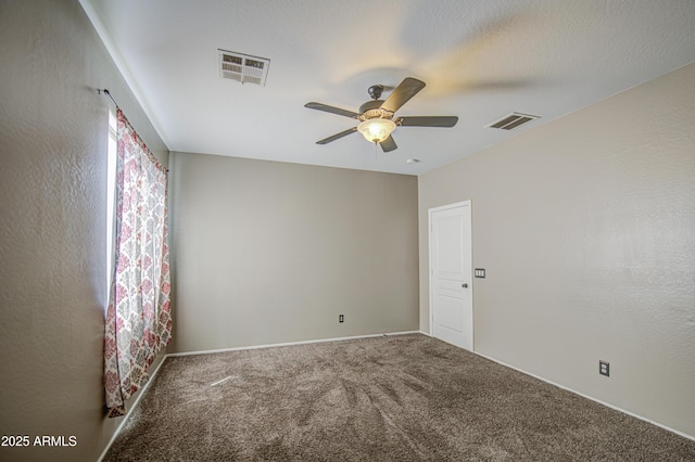 6811 W Darrel Rd, Laveen, AZ 85339 - empty room with a ceiling fan, carpet flooring, and visible vents